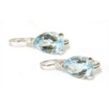 A pair of white gold aquamarine and diamond earrings,