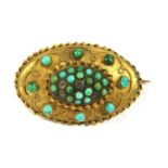 A Victorian Etruscan Revival style gold turquoise brooch,