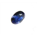 An unmounted oval mixed cut sapphire,