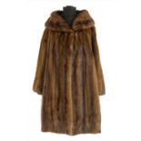 A brown mink fur jacket