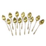 A set of twelve German silver gilt demitasse spoons,