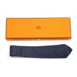 An Hermès tie,