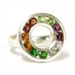 A silver assorted gemstone ring,