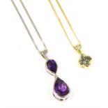 An 18ct gold green sapphire and diamond pendant,