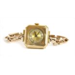 A ladies' 9ct gold mechanical bracelet watch,