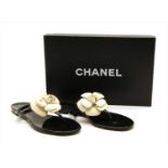 A pair of Chanel camellia flower jelly thong sandals,