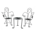 A pair of Cecil Beaton designed ‘Swan’ wire work garden chairs and a small table