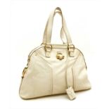 A Yves Saint Laurent cream leather muse shoulder bag