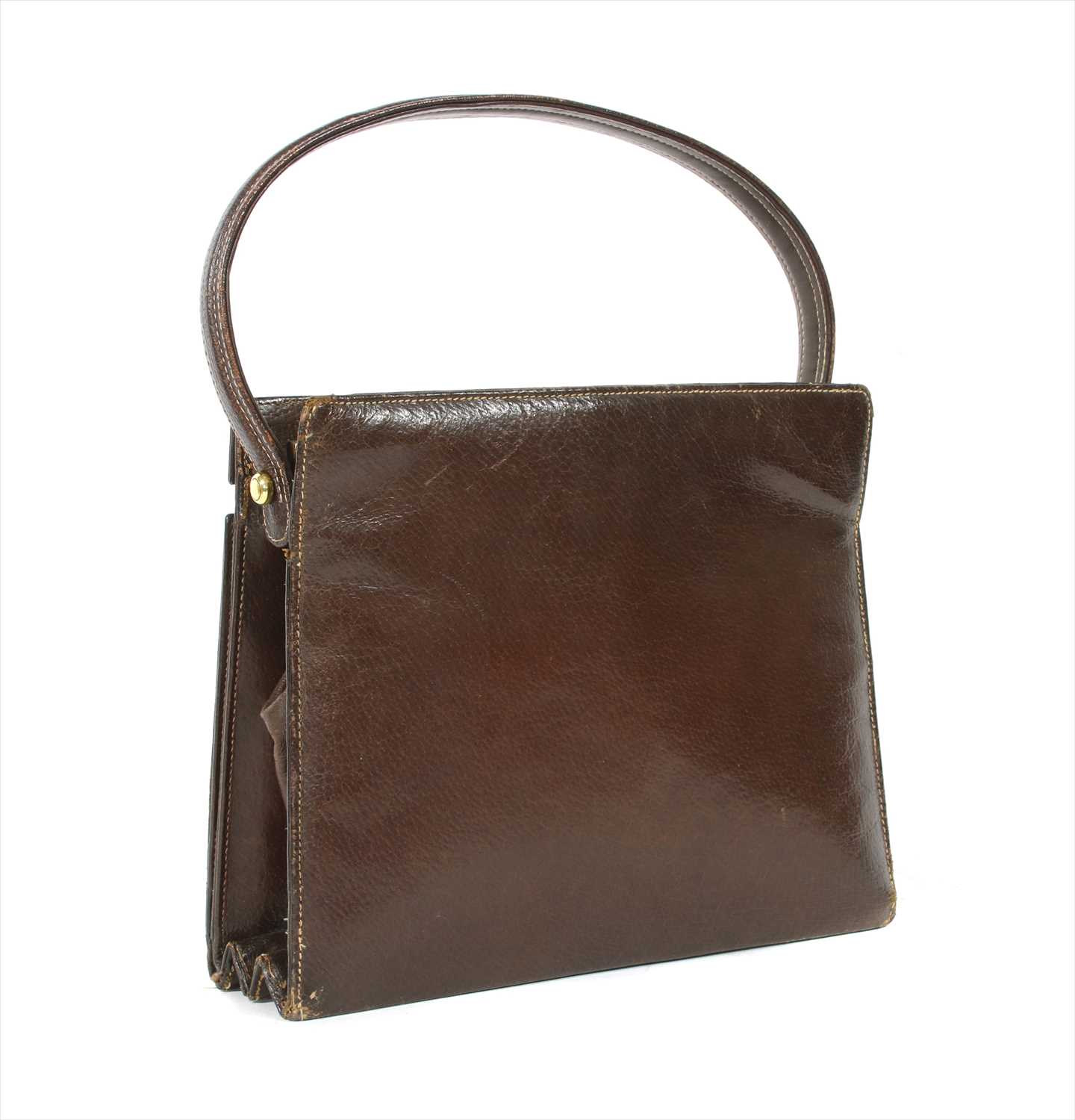 A vintage Gucci leather writing travel handbag
