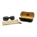 A pair of Chanel black framed sunglasses,
