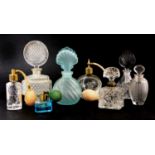 A large collection of perfume and scent bottles,