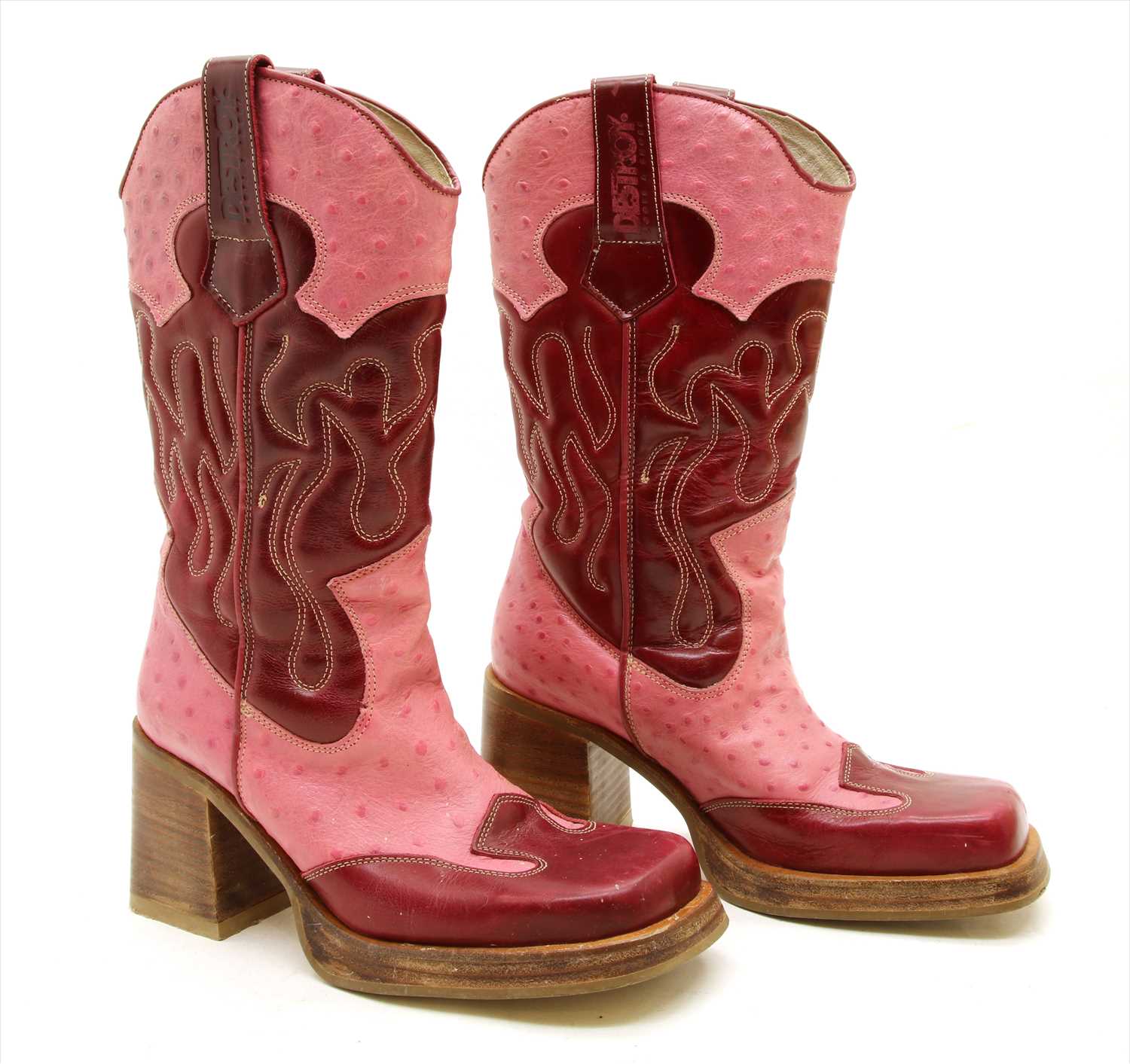 A pair of Destroy pink ostrich skin and leather heeled cowboy boots