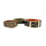 Three gentleman's leather belts, one with detachable silver moose head buckle