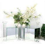 Two pairs of glass candlesticks, and two mirrored cubes