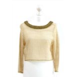 A Ermanno Scervino cream crochet crop top