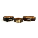 Three gentleman's leather belts, black, brown and olive green