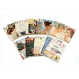 A collection of Vogue magazines,