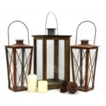 A pair of antique style rusted terrace lanterns, and a large garden lantern