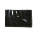 A vintage Hermès black Courchevel Rio clutch bag