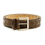 A Pickett of London gentleman's brown hornback crocodile belt