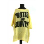 Katharine Hamnet 'Protect and Survive' shirt and Comme de Garcons long sleeved top
