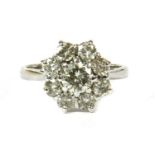 An 18ct white gold diamond cluster ring,