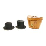 A 19th century leather cased silk top hat,