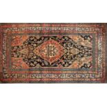 A Persian design rug,