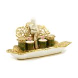 An English figural inkstand, possibly Spode,