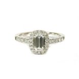 A platinum diamond halo cluster ring,