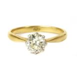 A gold and platinum single stone diamond ring,