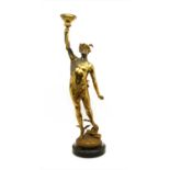 A bronzed figural table lamp depicting Hermes