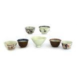 A collection of Chinese and Japanese tea cups,