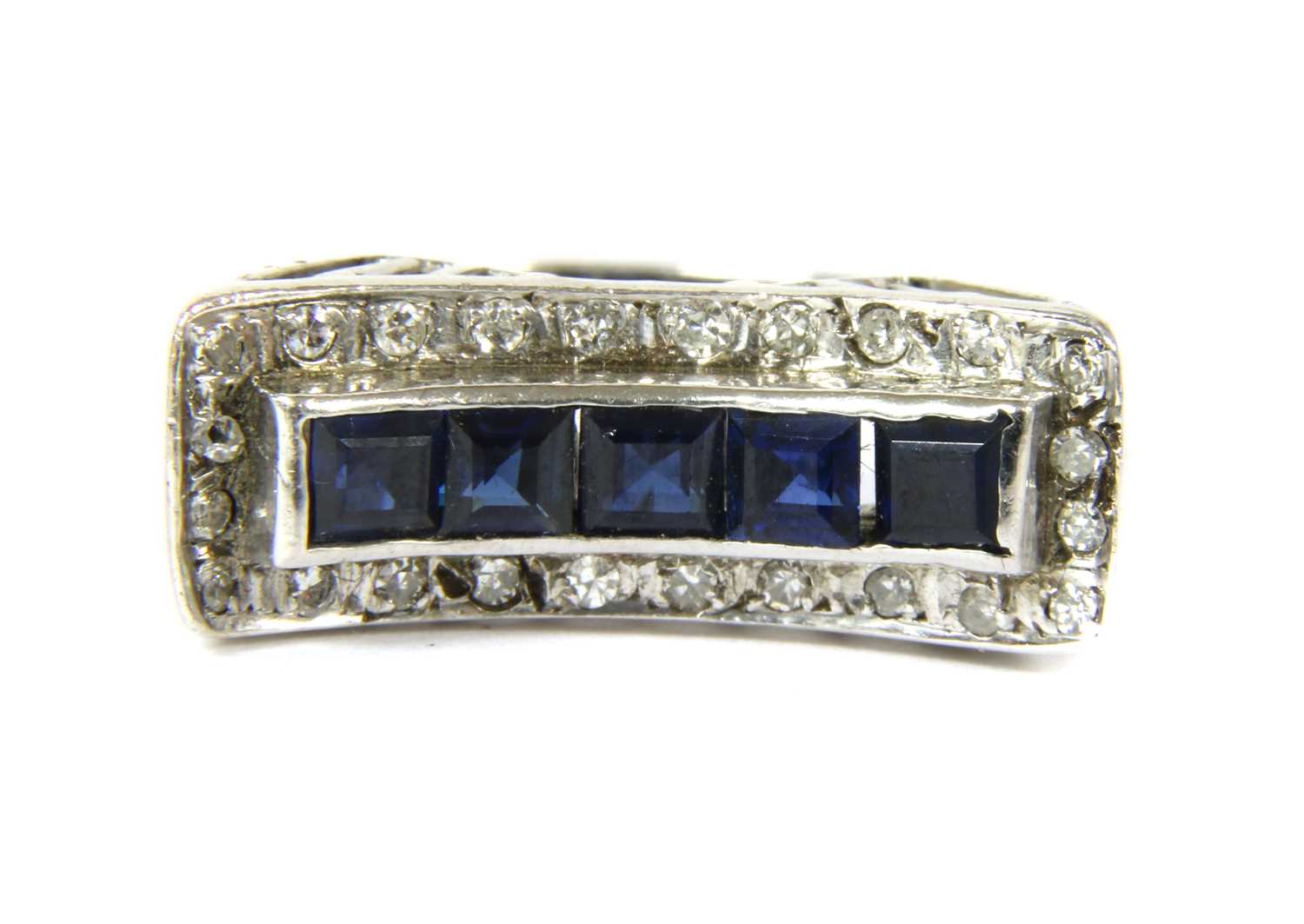 A white gold sapphire and diamond dress ring, c.1950,