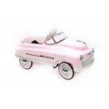 A child's 1950's style tinplate pedal car,