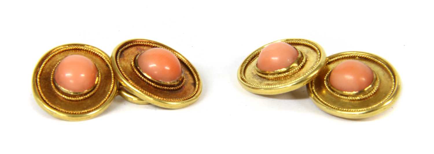 A pair of gold coral cufflinks,