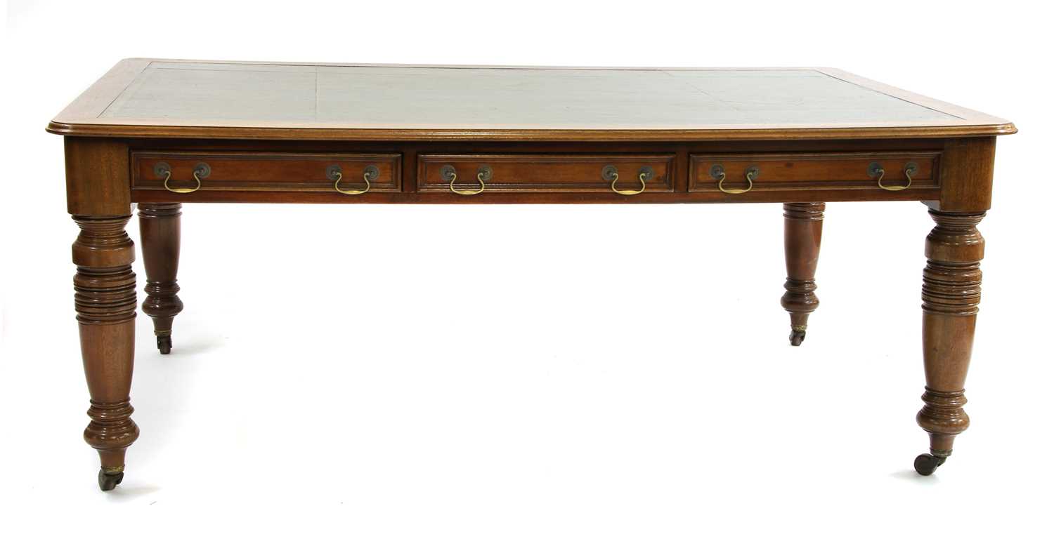 A large mahogany writing table,