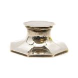 An octagonal silver capstan inkwell,