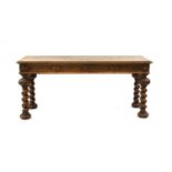 A carved oak hall table,