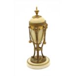 A French white marble and gilt bronze cassolette candlestick,