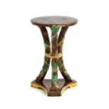 A Victorian majolica jardinière stand,