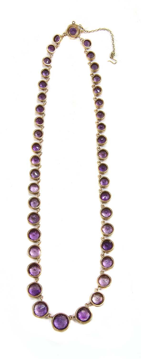 A Victorian gold amethyst graduated rivière necklace, c.1880, - Image 2 of 2