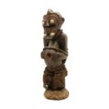 A carved Igbo Tribal Fetish figure