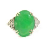 A white gold jade and diamond ring,