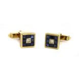 A pair of gold diamond and sapphire cufflinks