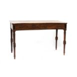 A Regency concave mahogany writing table