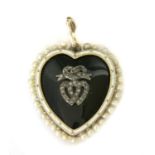 A Victorian gold onyx, diamond, enamel and seed pearl heart pendant,