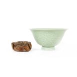 A moulded, two-colour celadon Bowl,