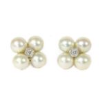 A pair of white gold diamond and cultured pearl stud earrings,