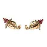 A pair of gold ruby and diamond flower clip earrings,